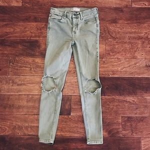 Free people soft green ripped knee jeans